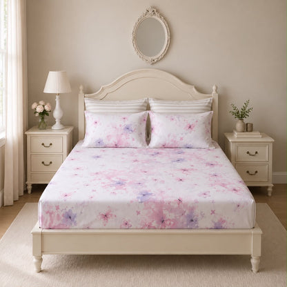 Blush pink butterfly print bedsheet on a bed