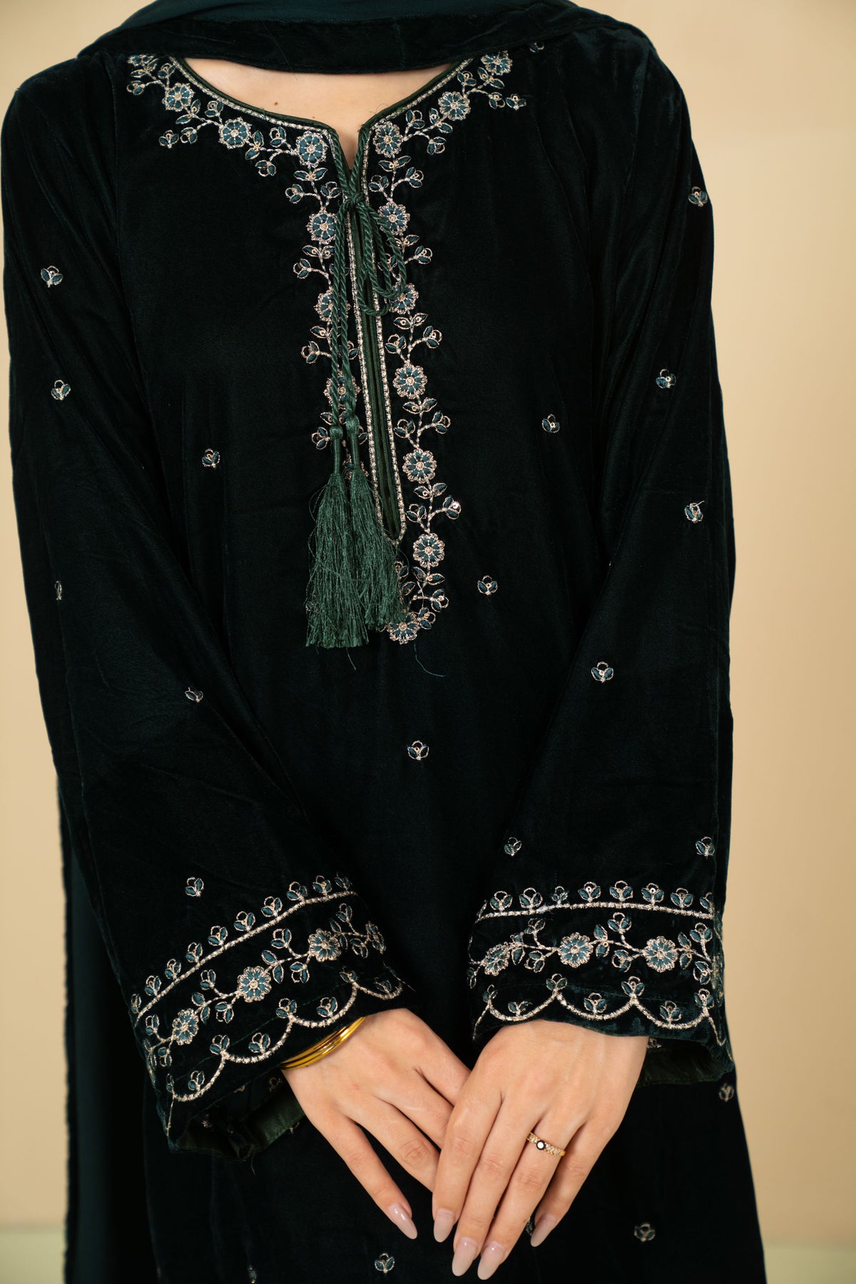 Bottle green embroidered velvet stitched suit by Tiraz
