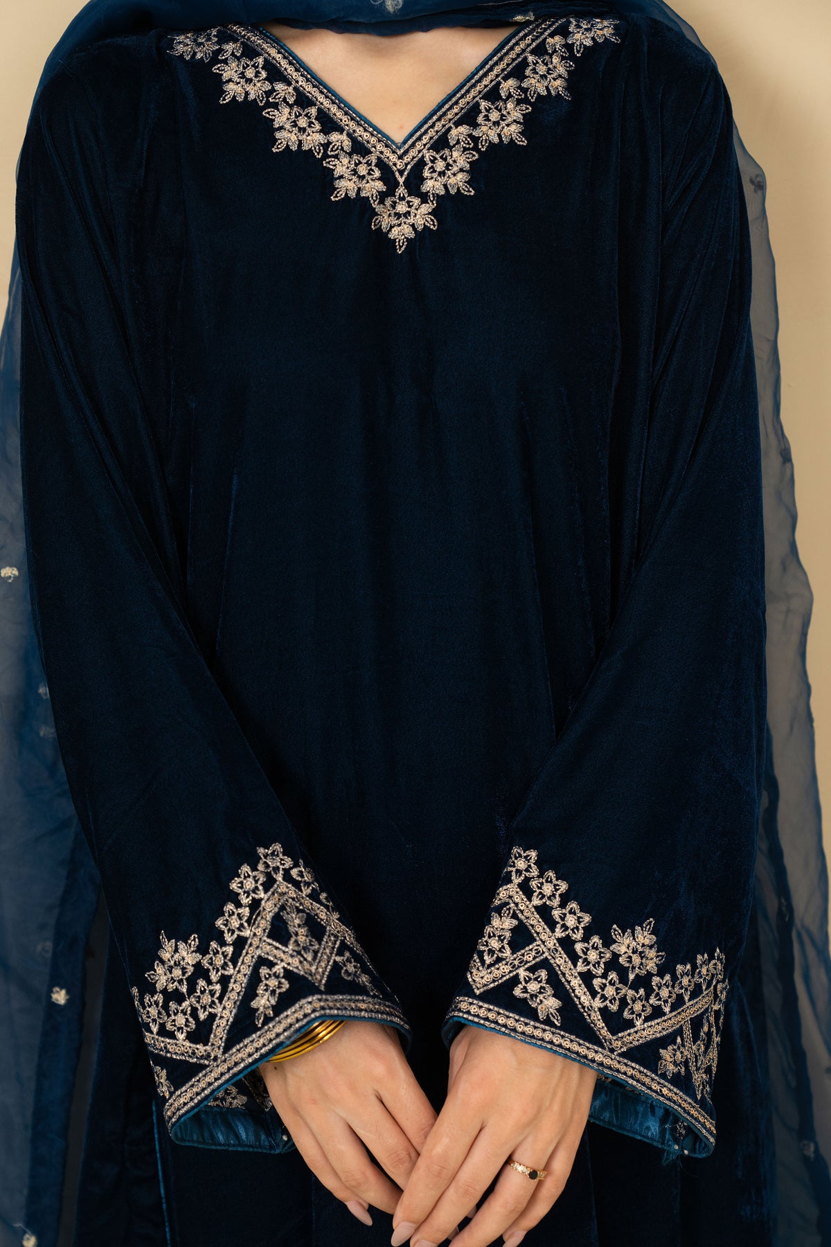 Teal blue embroidered velvet stitched suit by Tiraz
