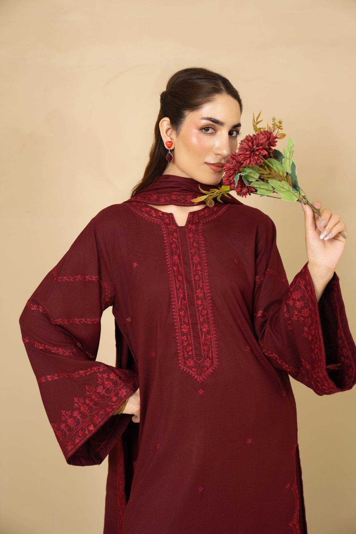 Model wearing Crimson maroon marina 3 piece