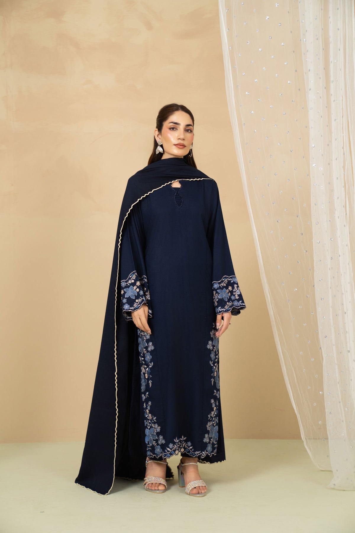 Model wearing Moonstone navy blue embroidered long shirt