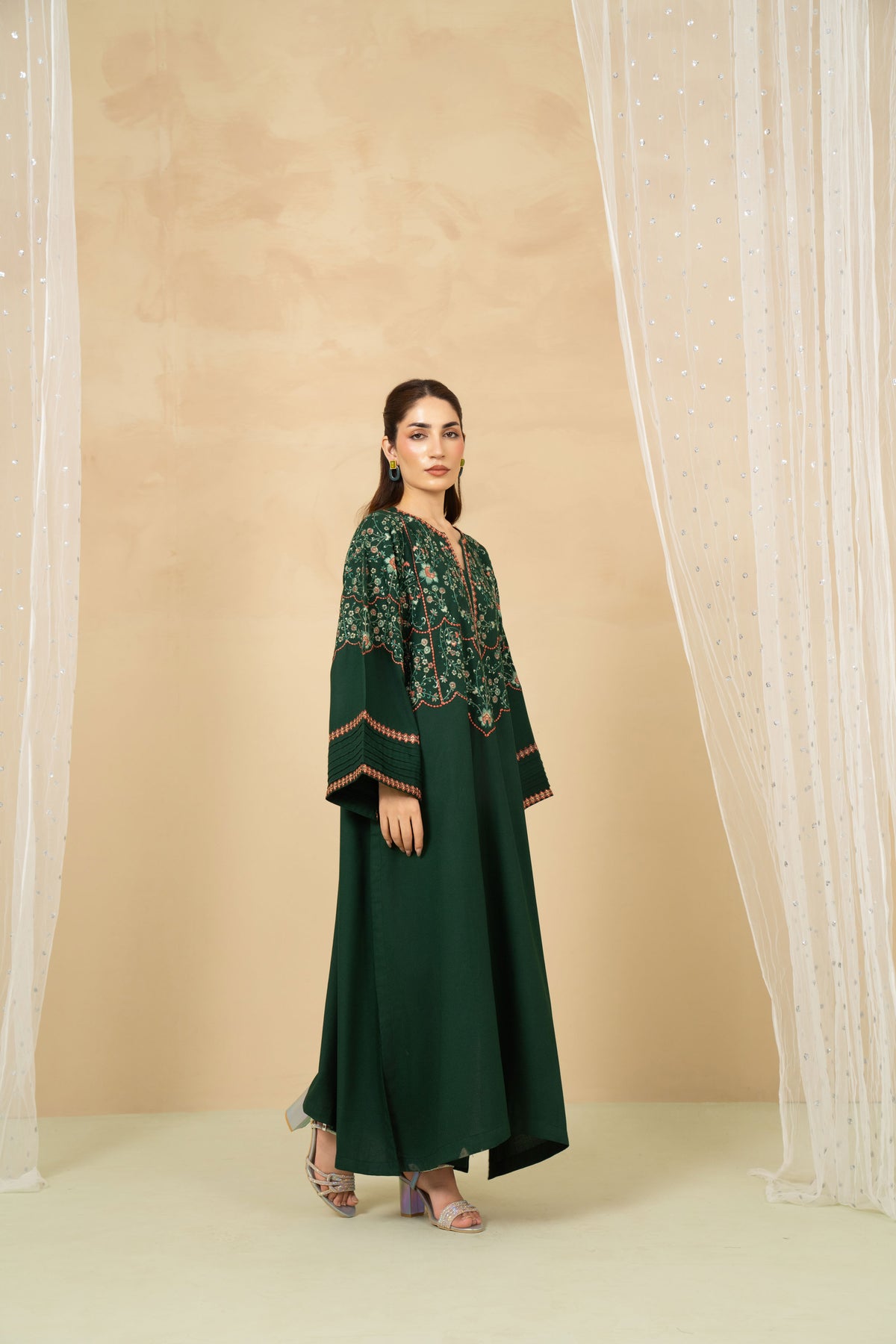 Model wearing Emerald bottle green A-line suit
