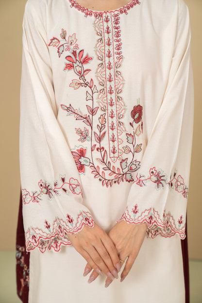 Moonlight maroon shawl against ivory suit