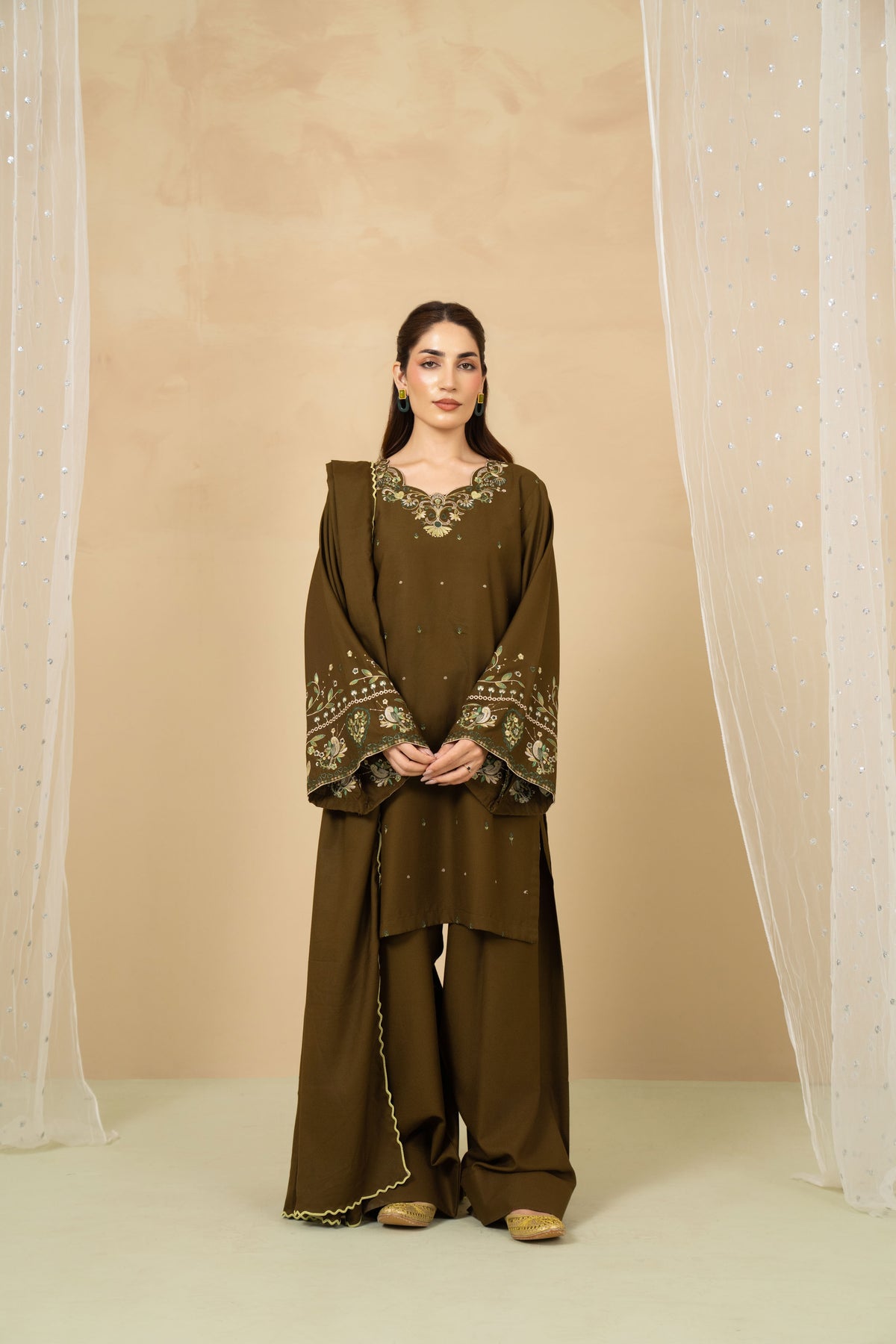 Model wearing Moss olive farshi shalwar suit