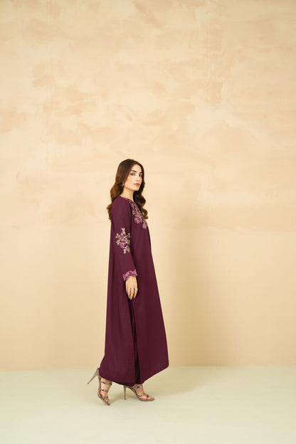 Model wearing Mulberry plum A-line suit