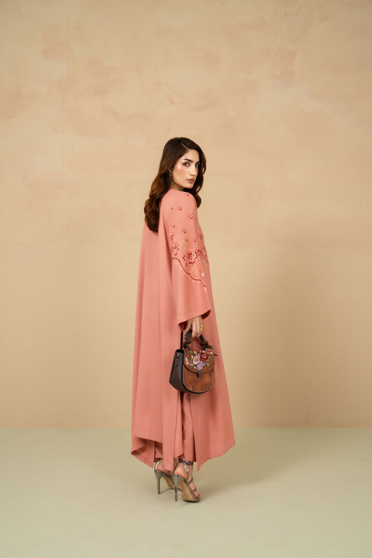 Blush Tea embroidery detail on tea pink shirt