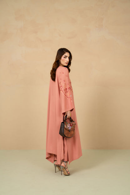 Blush Tea embroidery detail on tea pink shirt