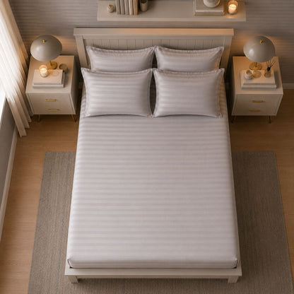 White bedsheet styled on a bed