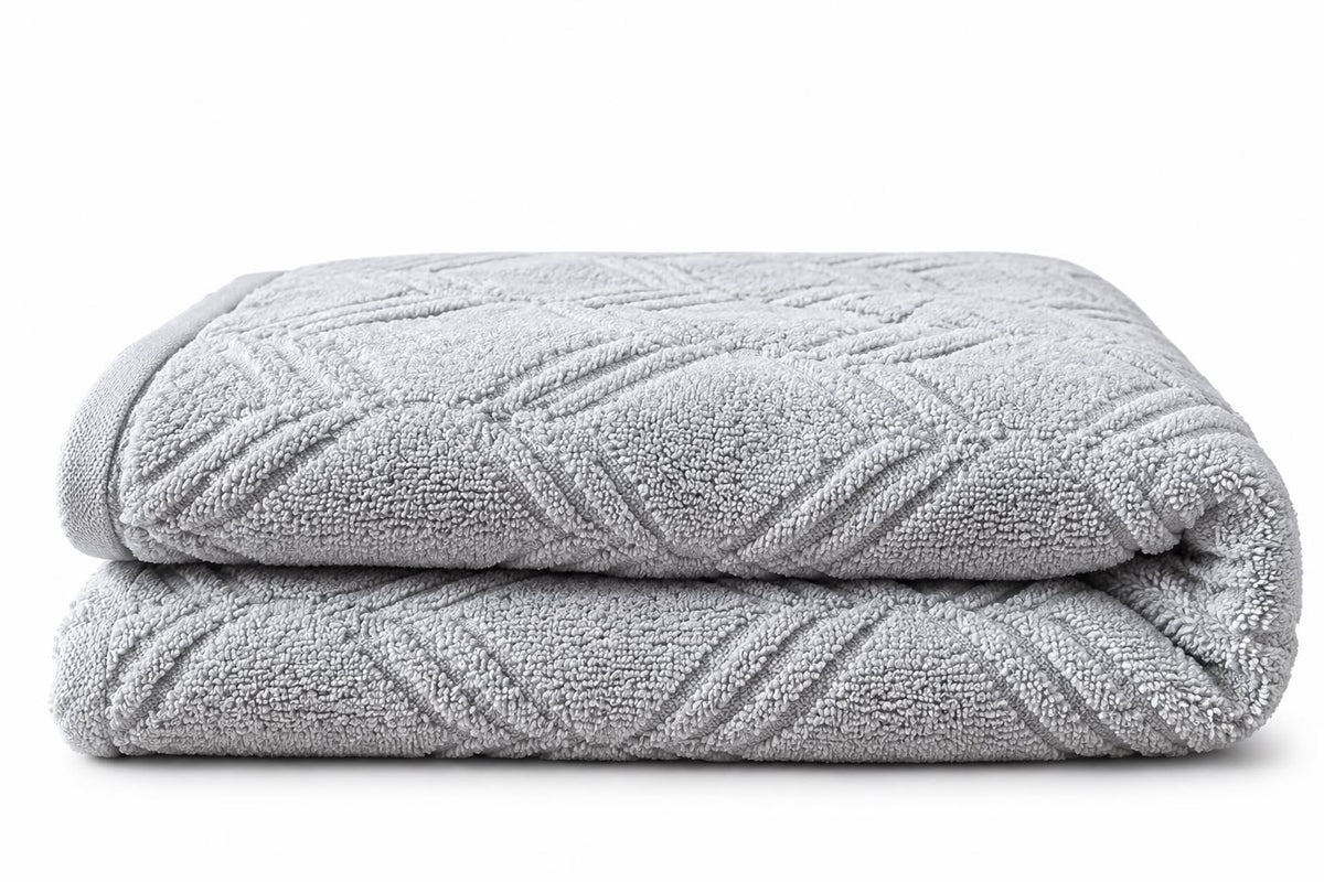 Grey pattern towel folded, cotton terry