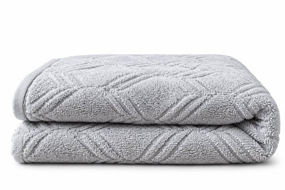Grey pattern towel folded, cotton terry