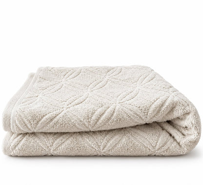 Creamy beige towel folded, cotton terry