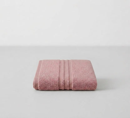 Tea pink bath towel by Tiraz Homes